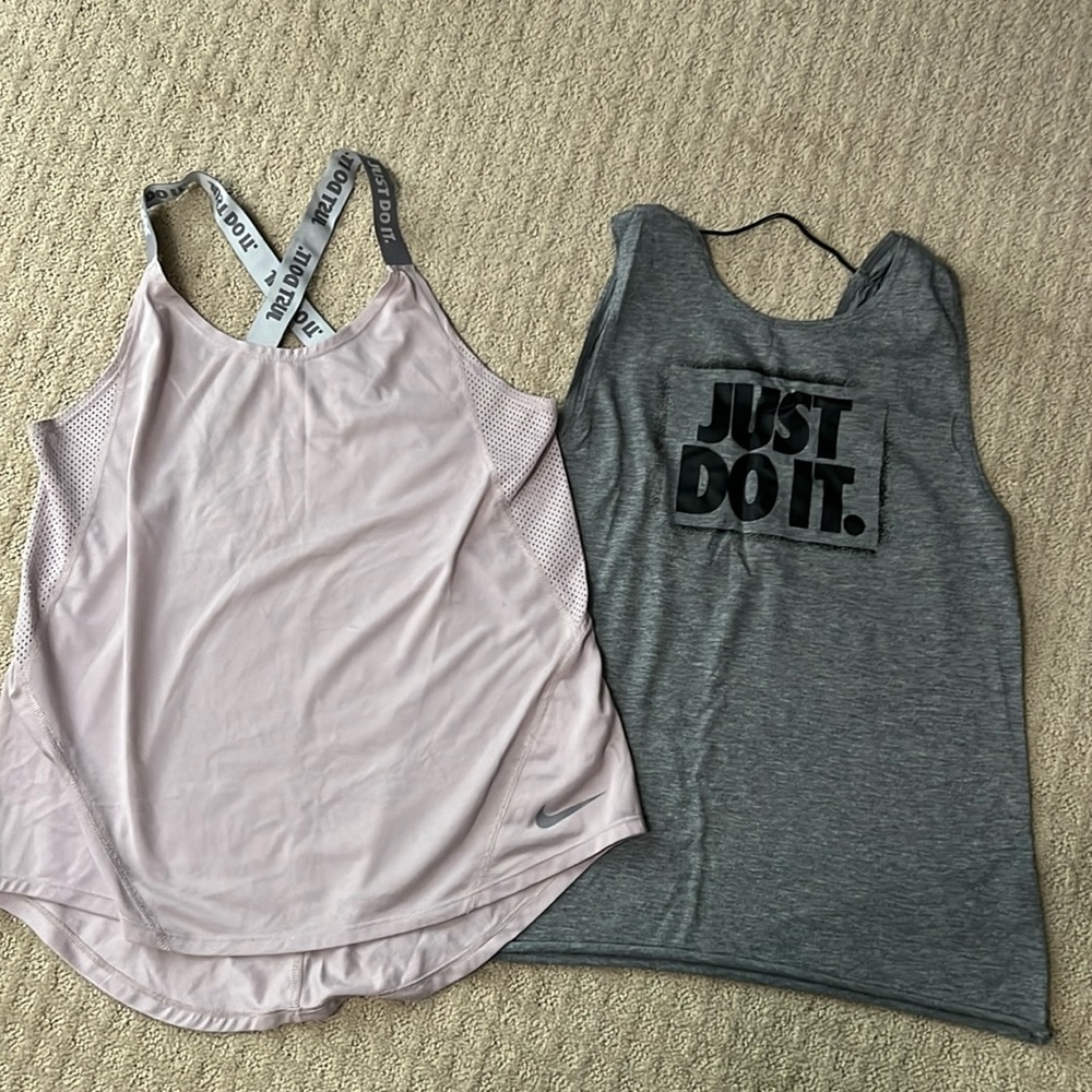 Two Nike women’s tank tops! Small & extra small.
